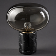Close-up of the Bramley smoked glass shade and black marble-style base