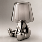 Close-up of the Brentwood reflective silver sculptural base and layered shade