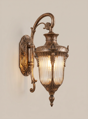 Bronze outdoor wall light on a clean studio background