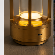Close-up of the gold Grosvenor lamp crystal diffuser and warm LED glow