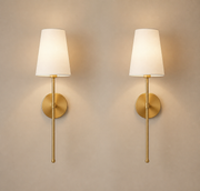 Set of two gold Harrow battery wall lights with cream fabric shades
