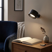 Norwood Rotatable Rechargeable Wall Light installed on an interior wall