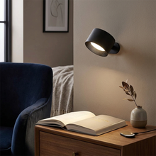 Norwood Rotatable Rechargeable Wall Light installed on an interior wall