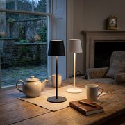 Marston Waterproof Cordless Table Lamp on a patio table