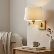 Marlowe Linen Swing Arm Battery Wall Light installed on an interior wall, White/Linen finish