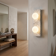 Holland White Marble Wall Light - vertical marble panel with two warm glass globes