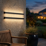 Ealing Long IP65 Linear Outdoor Wall Light - Black, installed on patio wall