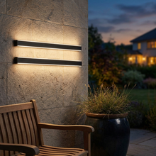 Ealing Long IP65 Linear Outdoor Wall Light - Black, installed on patio wall