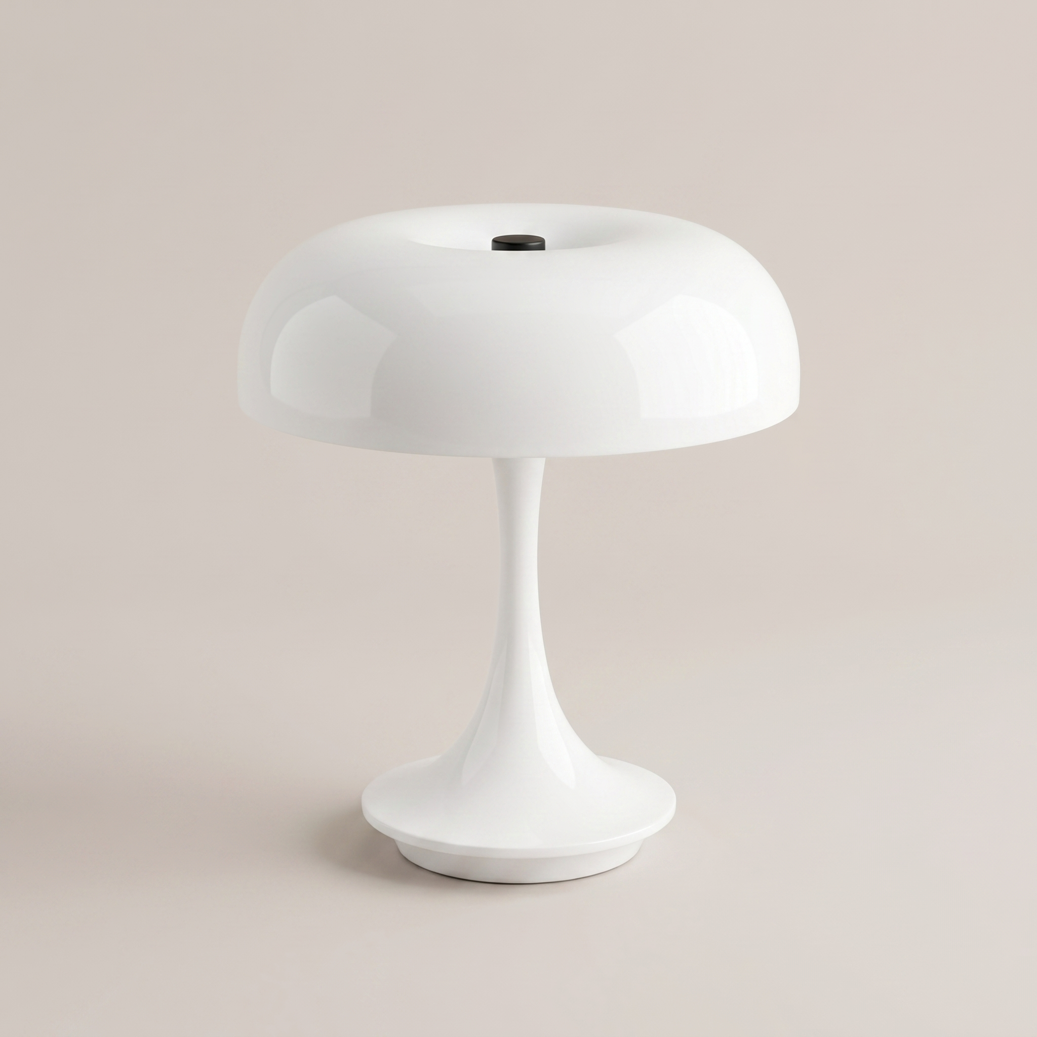 White cordless table lamp on a clean studio background