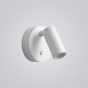 White pivoting wall light with cylindrical head on plain background