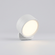 Round dome-shaped magnetic wall light on plain background