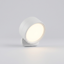 Round dome-shaped magnetic wall light on plain background