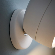 Close-up of dome head and magnetic mount on wall light