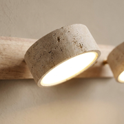 Close-up of travertine stone texture on wall light head