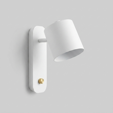 White rotatable cone wall light on plain background