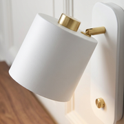 Close-up of rotatable cone shade and wall mount