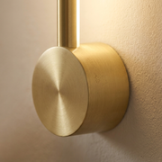 Close-up of end mount and finish on long linear wall light