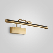 Brass and black picture-style wall light on plain background