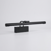 Matte black picture-style wall light on plain background