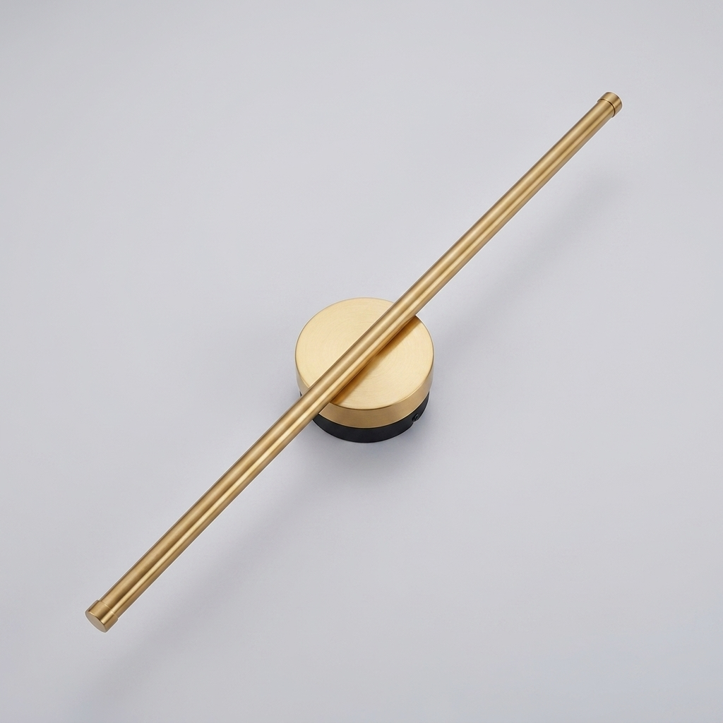 Gold vertical linear wall light on plain background