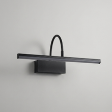 Black linear rechargeable wall light on a clean studio background