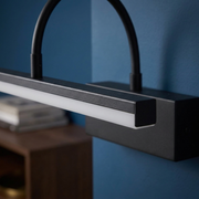Close-up of the linear diffuser and finish detail of the wall light