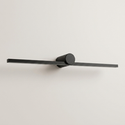 Black battery wall light on a clean studio background