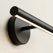 Close-up of the arm and finish detail of the wall light