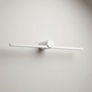 White battery wall light on a clean studio background
