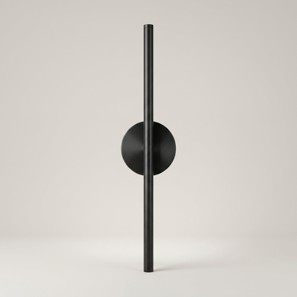 Black battery wall light on a clean studio background