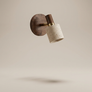 Belgravia walnut travertine reading wall light in Walnut finish, clean studio photo