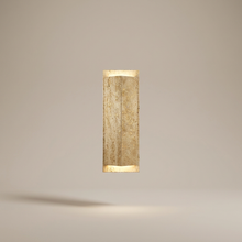 Travertine wall light on a clean studio background