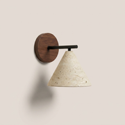 Stratford travertine cone wall light with dark walnut backplate on a clean background