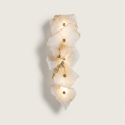 Radley marble wall light with folded alabaster panels on a clean background