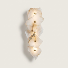 Radley marble wall light with folded alabaster panels on a clean background