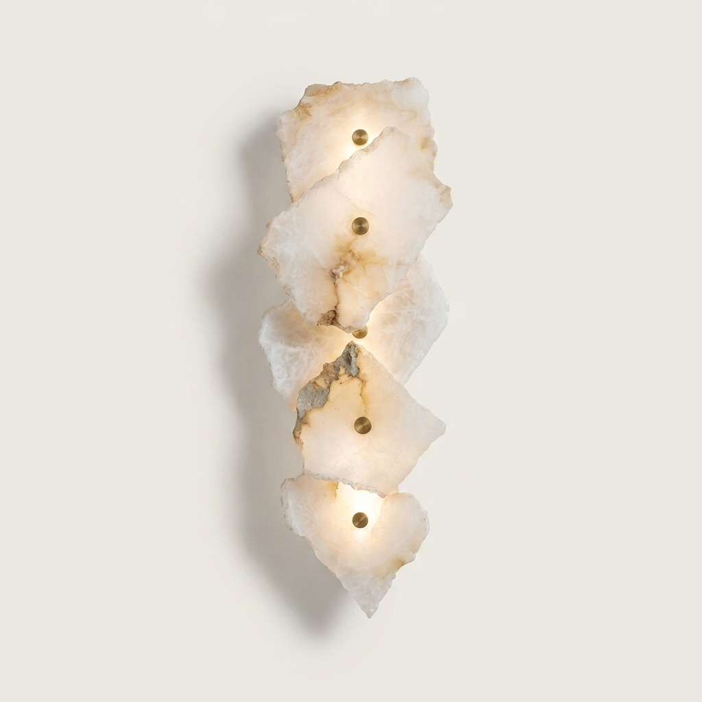 Radley marble wall light with folded alabaster panels on a clean background