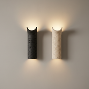 Dorset Travertine Wall Light - beige and black finishes, on a clean studio wall