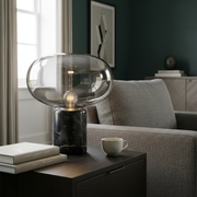 Bramley Marble Glass Cordless Table Lamp on a living room side table
