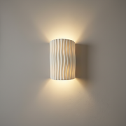 Corby Resin Wall Light on a clean studio wall