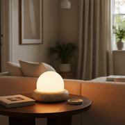 Huxley Travertine Cordless Table Lamp - Cream, on a living room side table