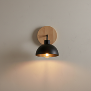 Lansdowne Wood Wall Light Plain - wood backplate and black dome, on a clean studio wall