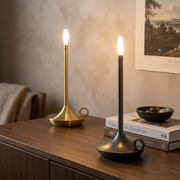 Rowan Cordless Table Lamp - Gold and Black candle-style pair, on a sideboard
