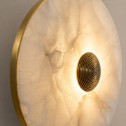 Close-up of the Kingston translucent alabaster-style veining, gold rim and ribbed centre