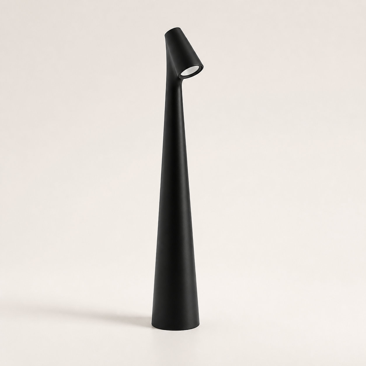 Leighton cordless table lamp in the black finish on a neutral background