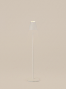 White cordless table lamp on a clean studio background