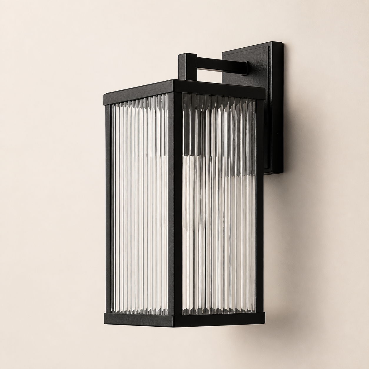 Mayfield black outdoor wall light with tall ribbed glass panels on a neutral studio wall