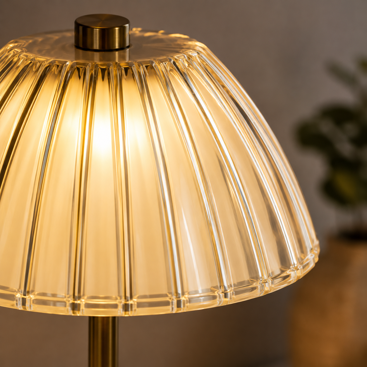 Close-up of the Rafferty lamp ribbed acrylic shade and warm glow