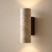 Rosedale travertine-style wall light with cylindrical stone sleeve and warm up-and-down light