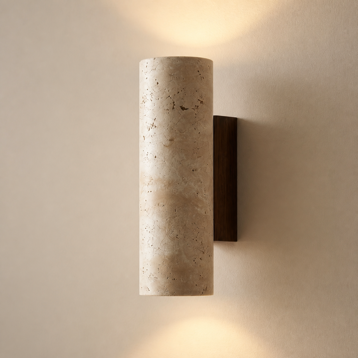 Rosedale travertine-style wall light with cylindrical stone sleeve and warm up-and-down light