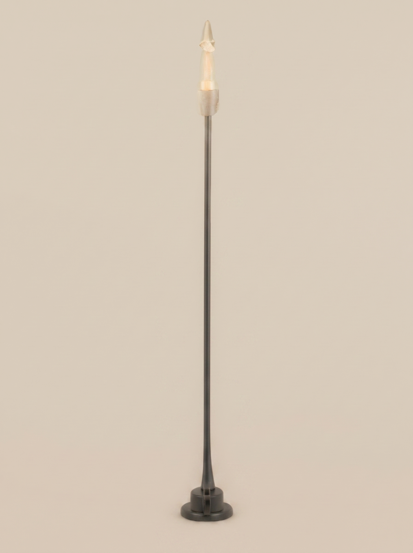 Black cordless table lamp on a clean studio background
